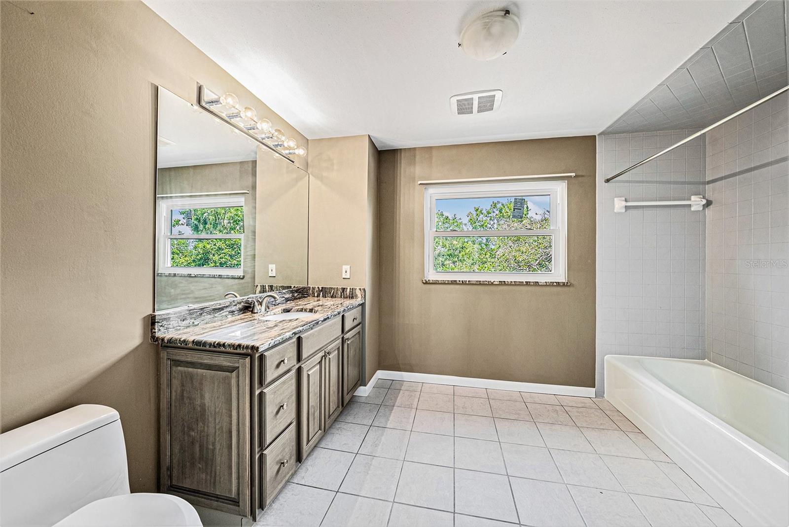 Primary bathroom with tub shower