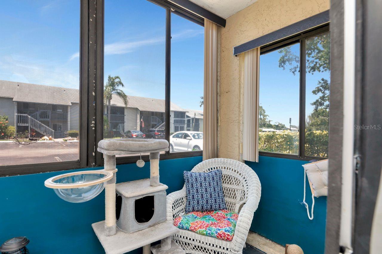Enclosed front porch.