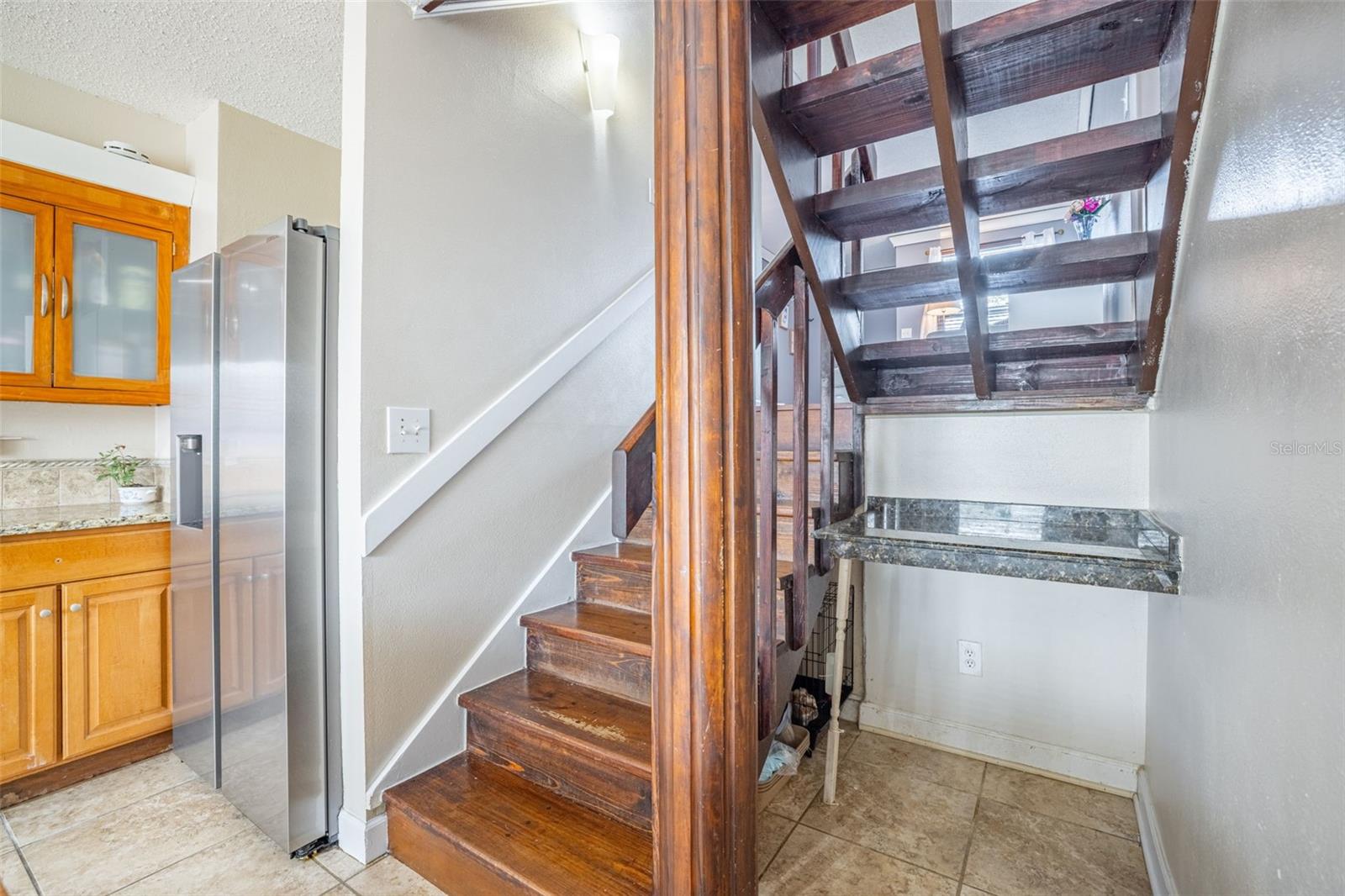 Built-in Desk.  Custom Open Stairway.