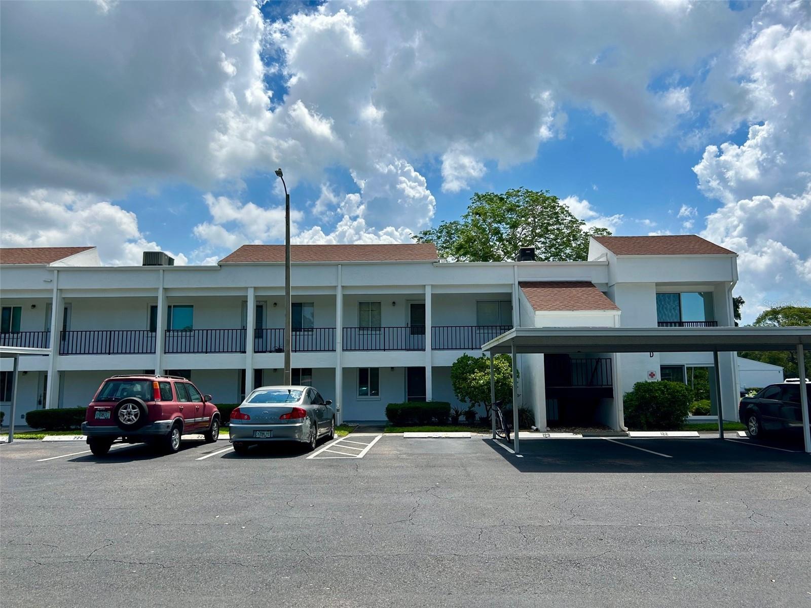Front Exterior - Assigned Carport Parking