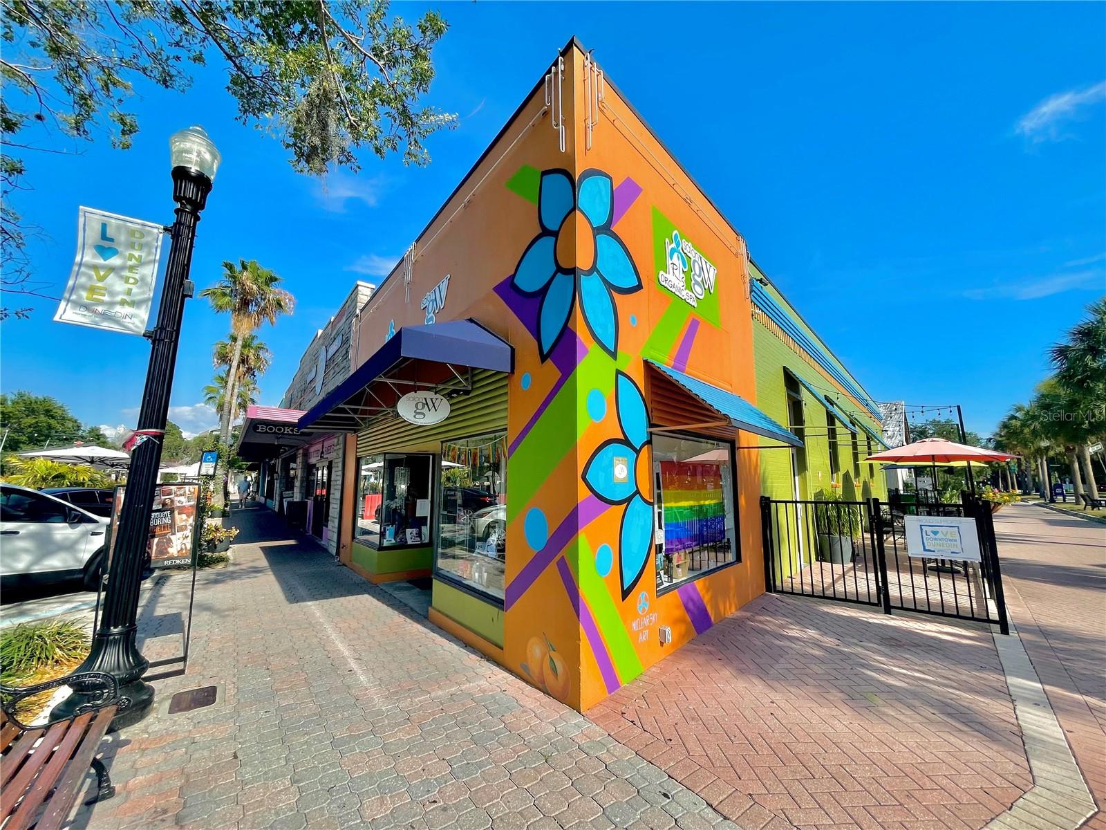 Corner Building on the Pinellas Trail and Main St.  Was Gregory Brady's Salon for years and years!