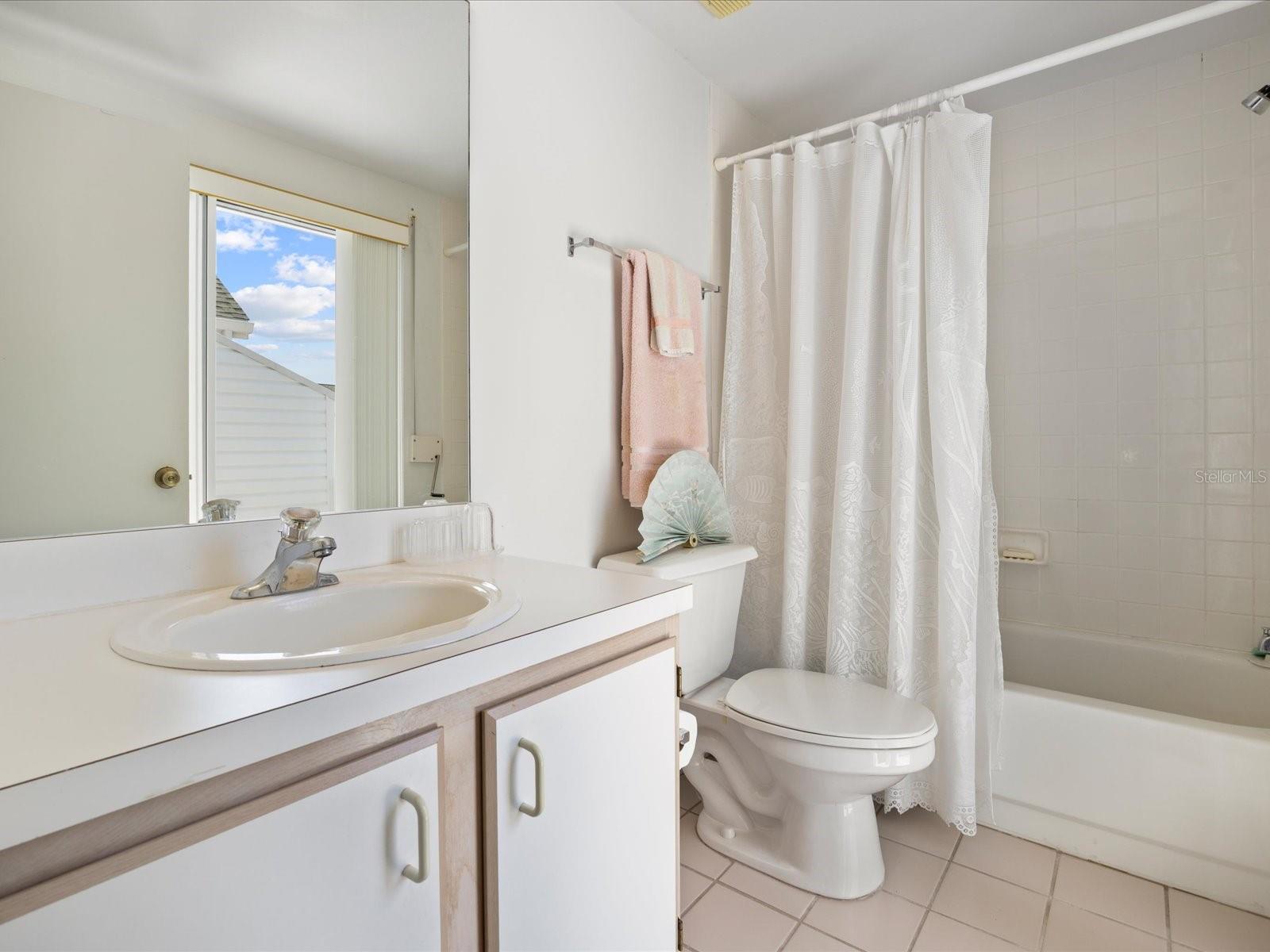 En-suite bathroom attached to third bedroom