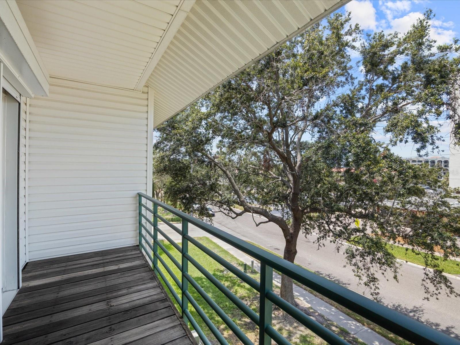 Primary bedroom has private balcony