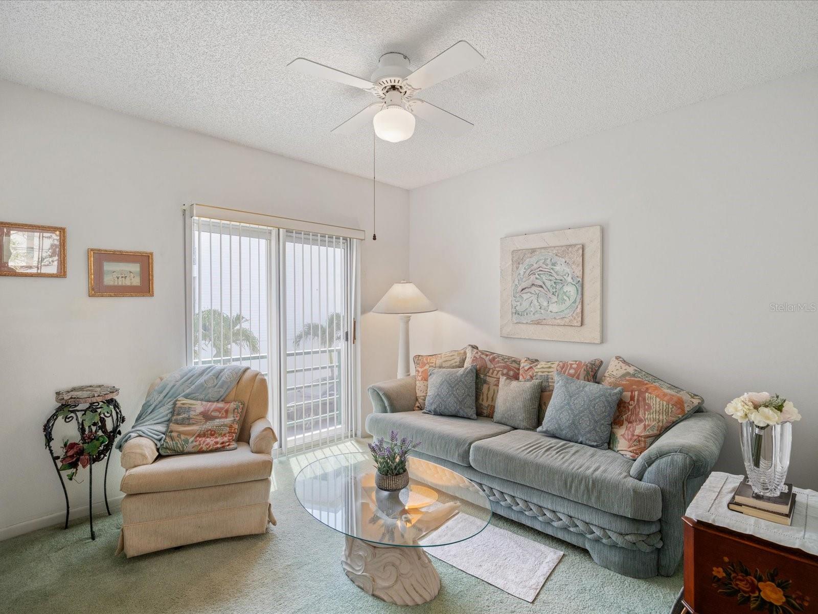Second bedroom w/ private balcony