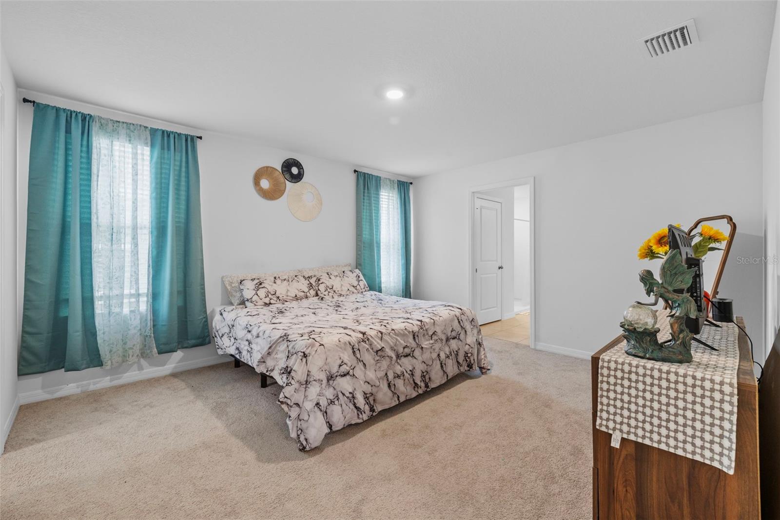 Primary Bedroom with a King sized bed