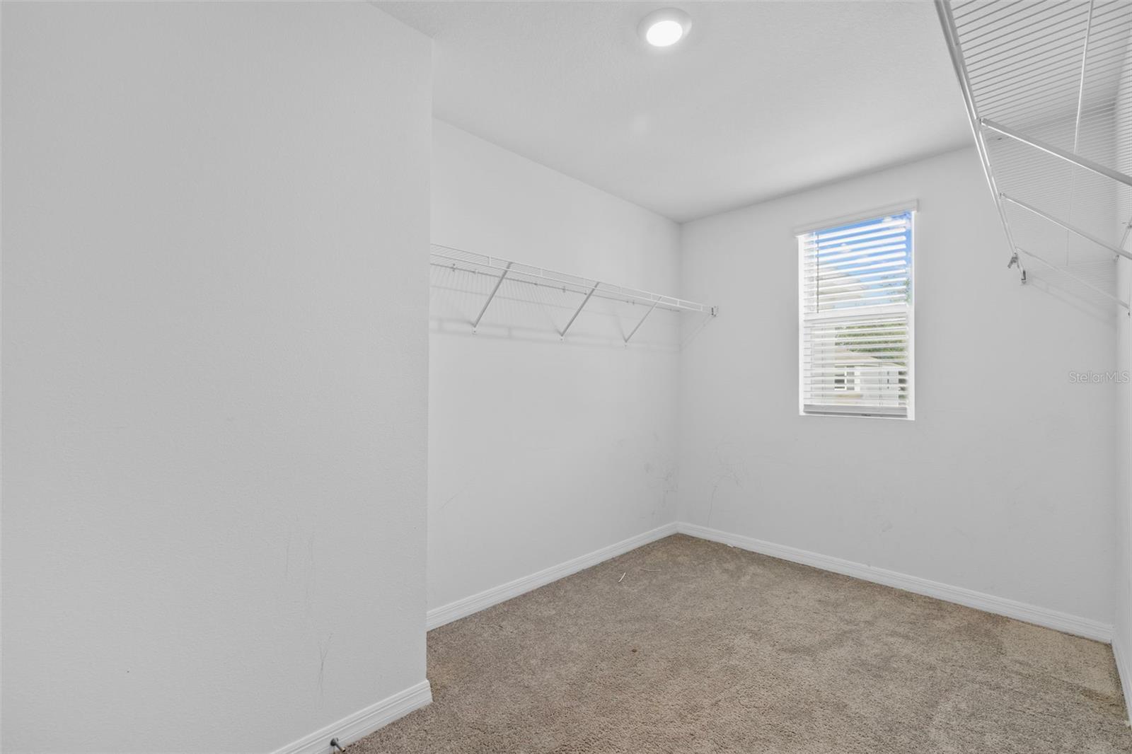 Primary Bedroom Walk in Closet!
