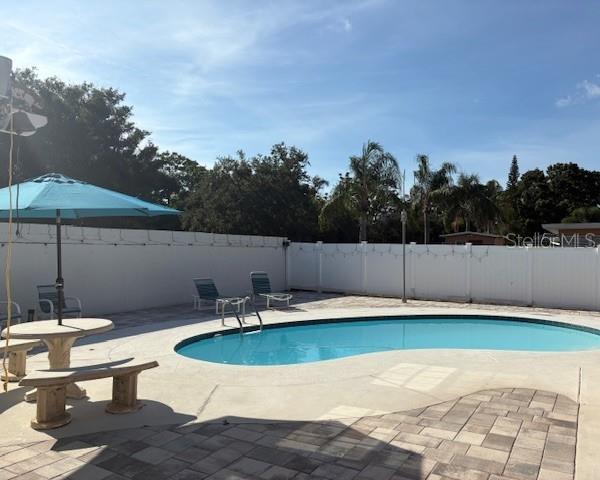 Pool and fenced back yard
