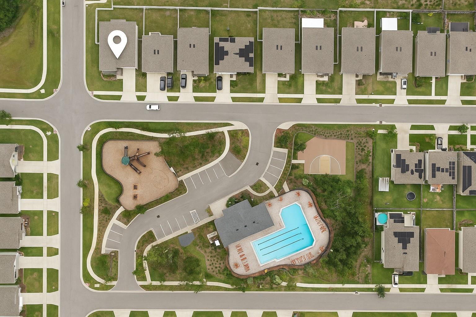 CORNER LOT right across the street from the amenity center!