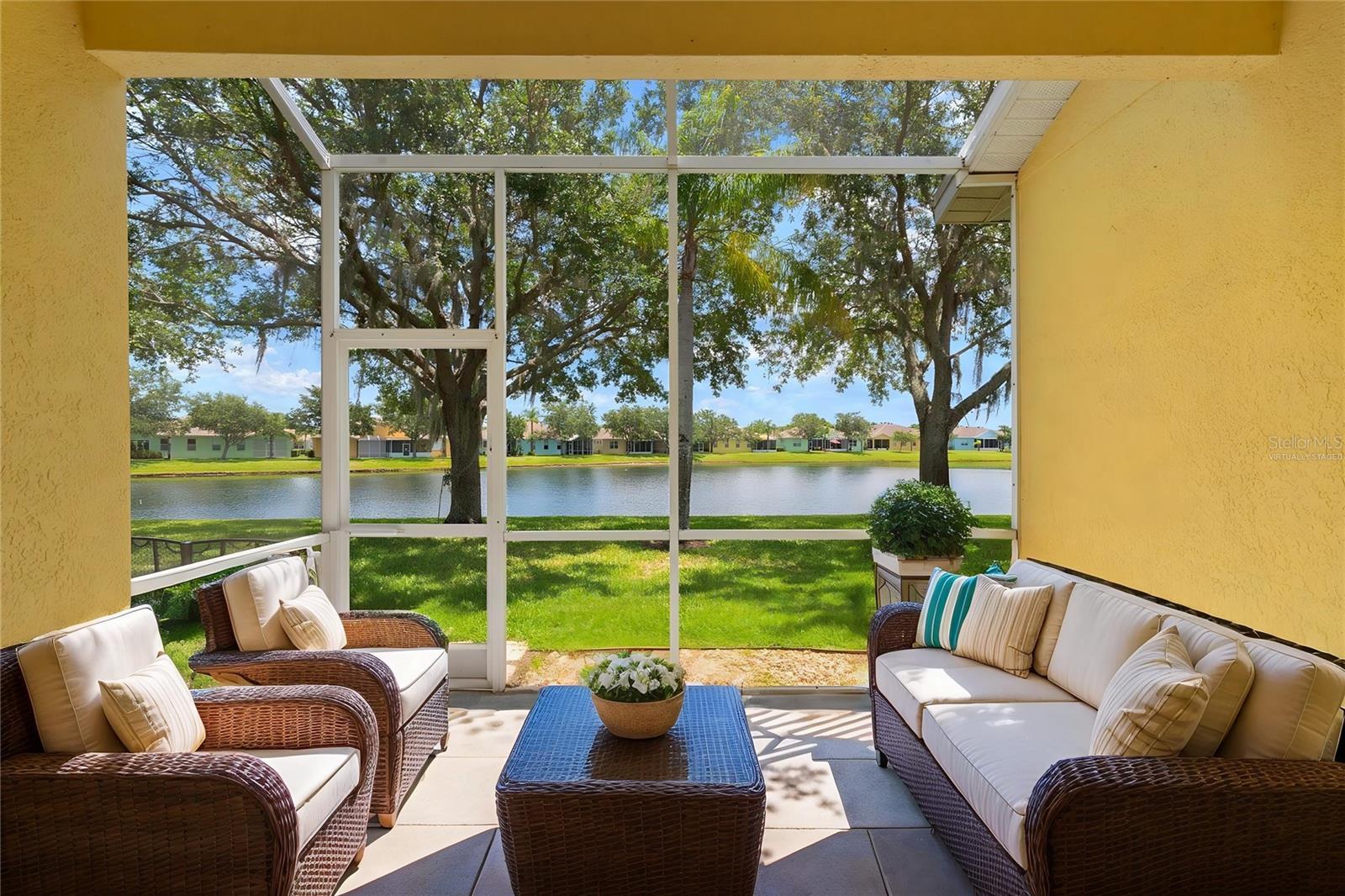 Virtually staged/ screen lanai vew pond vew
