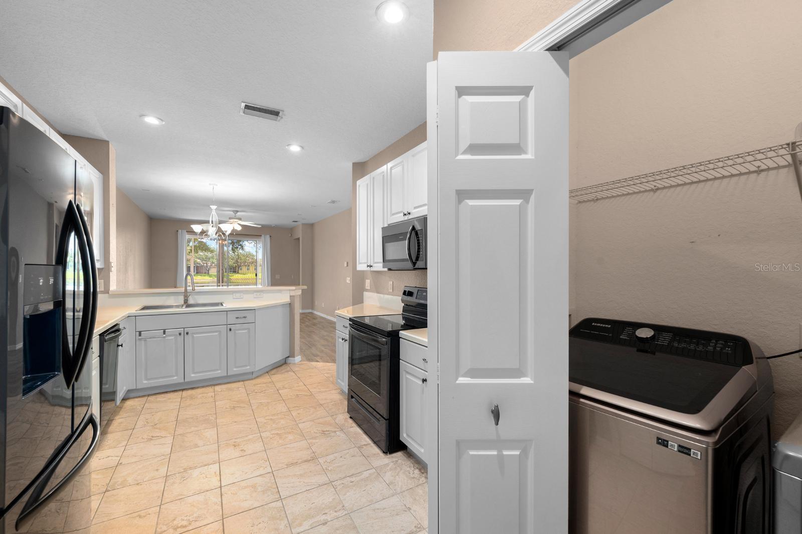 laundry closet in the kitchen