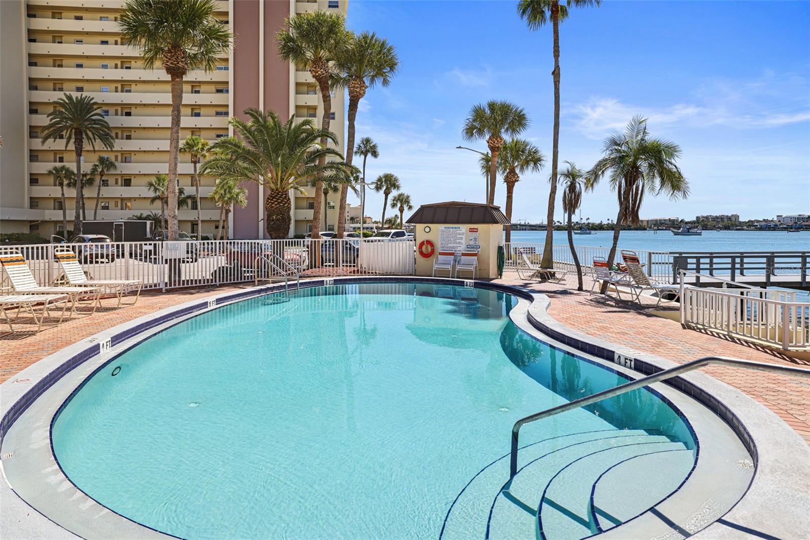 Beach House Pool with Fishing Pier in the background