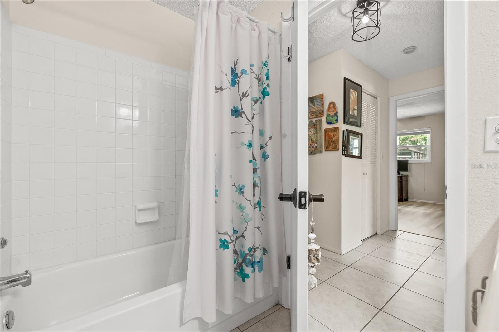 Full bathroom with tub.