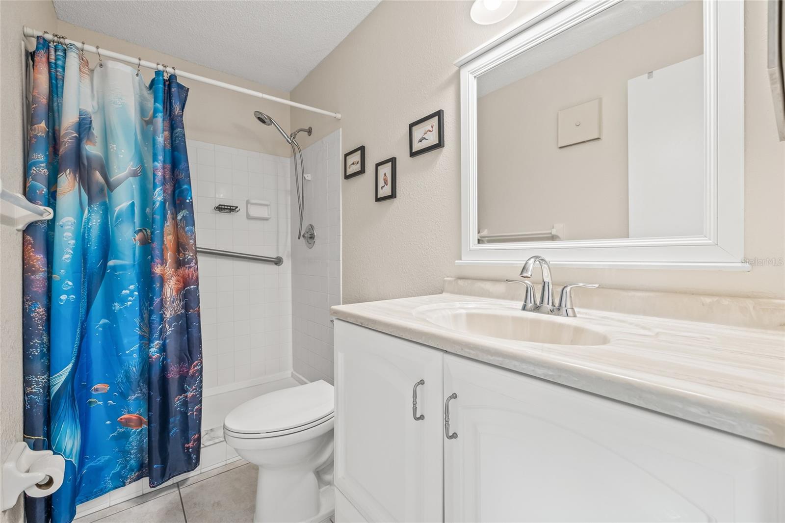Primary Bathroom with step in shower.