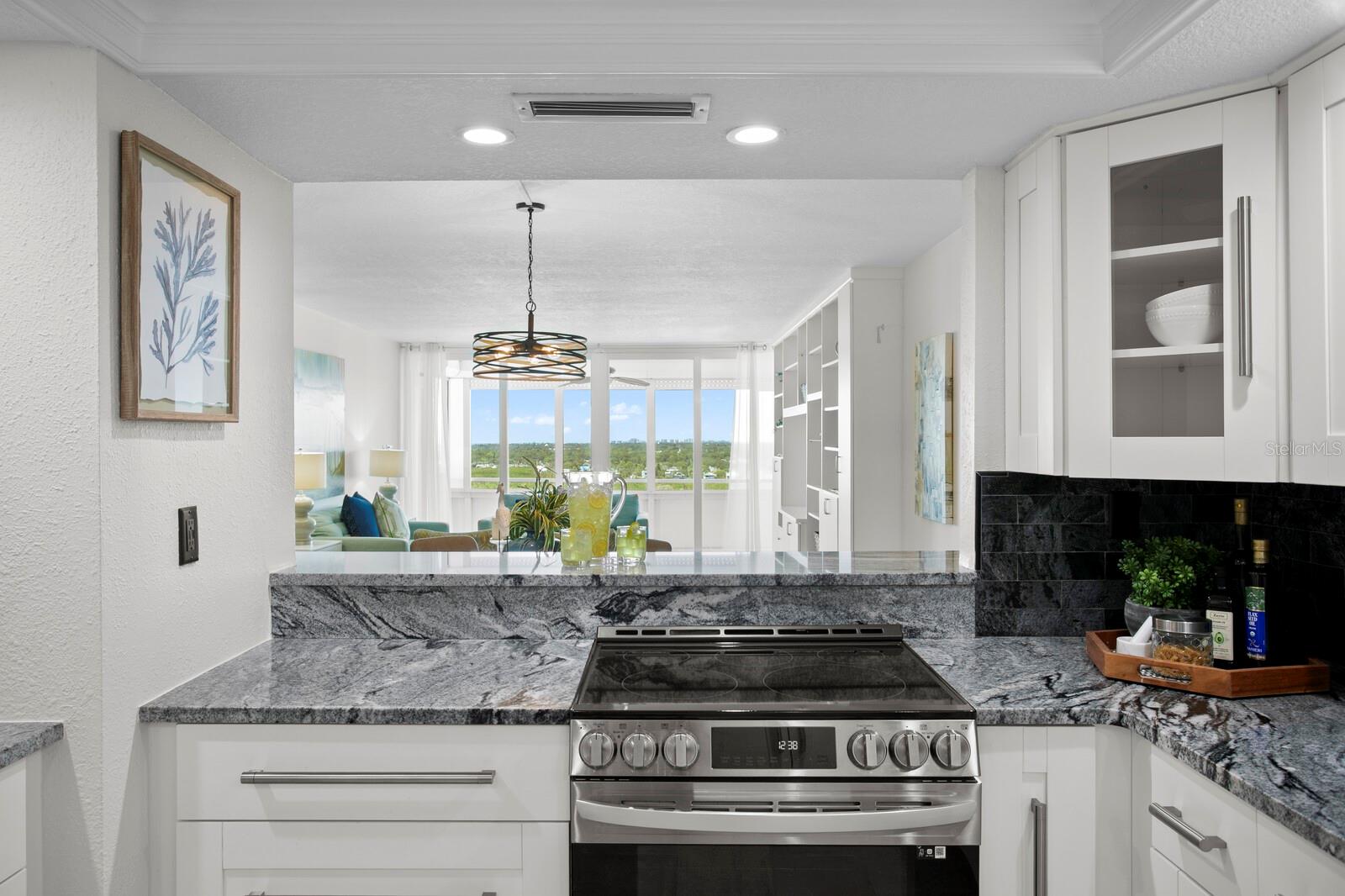 Kitchen features sleek stainless / brushed nickel appliances. https://player.vimeo.com/video/1087835561