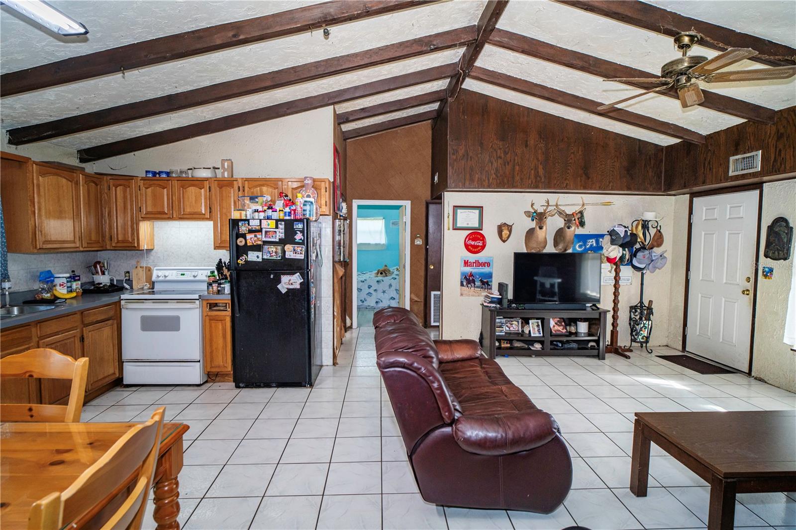 view from livingroom to diningroom and kitchen