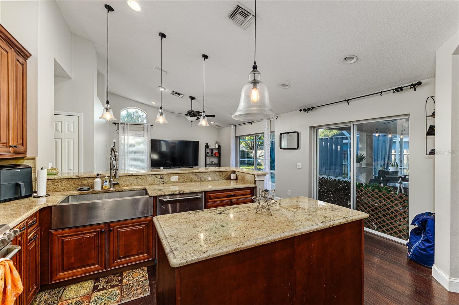 granite countertops, wood cabinets