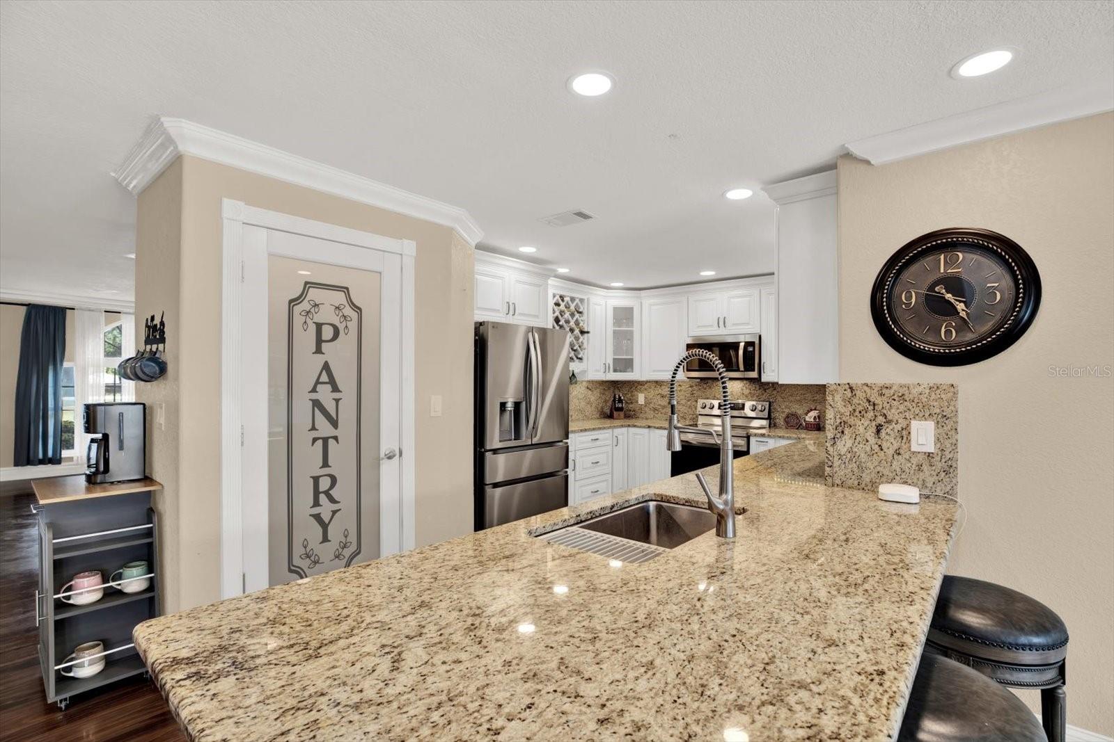KITCHEN WITH WALK- IN PANTRY