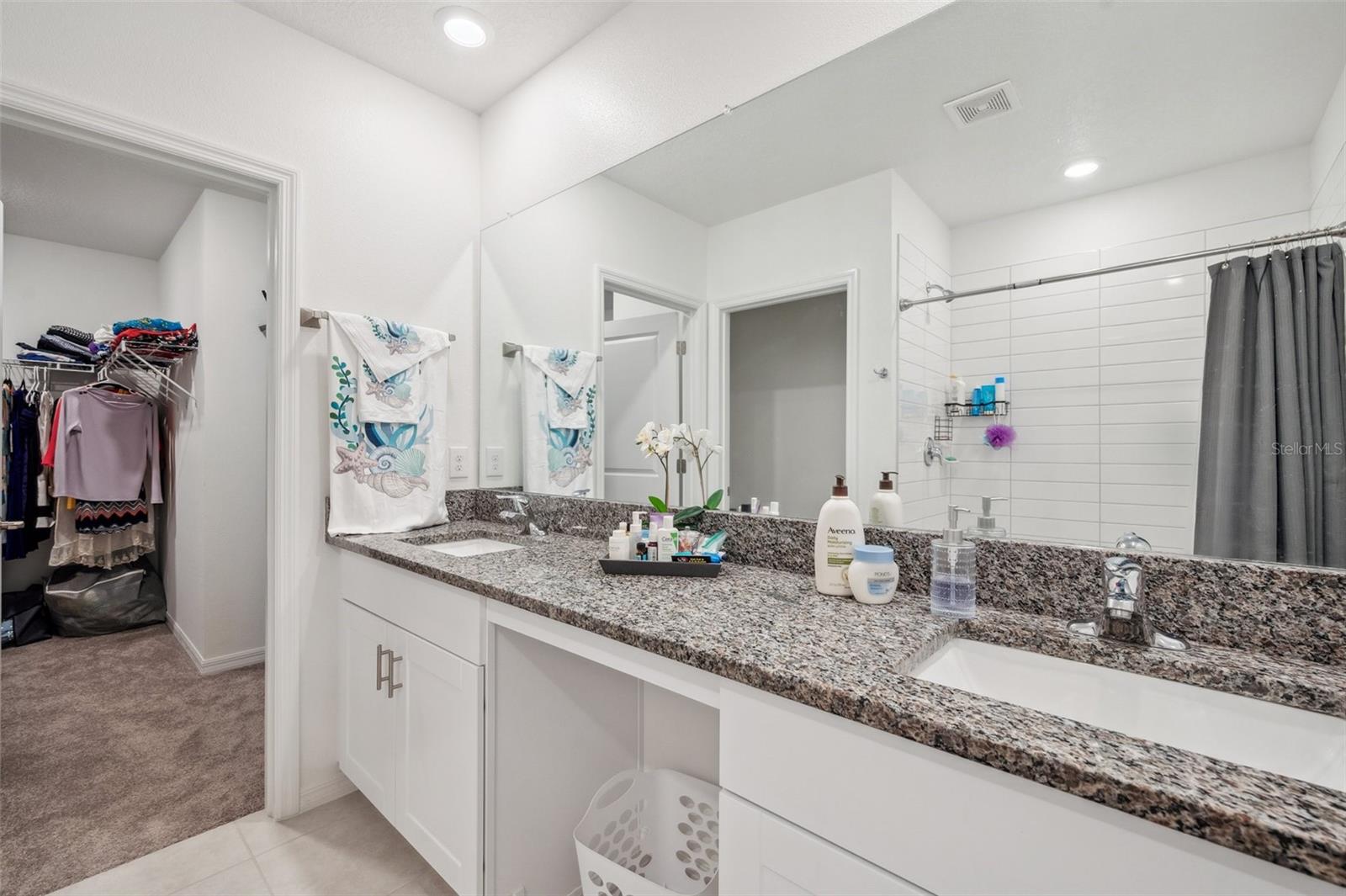 Dual sinks in primary bathroom