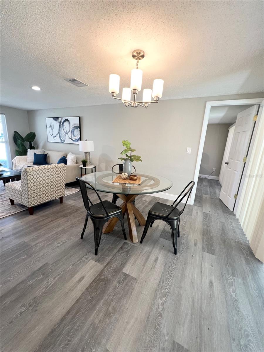 VIEW OF DINING AREA FROM KITCHEN