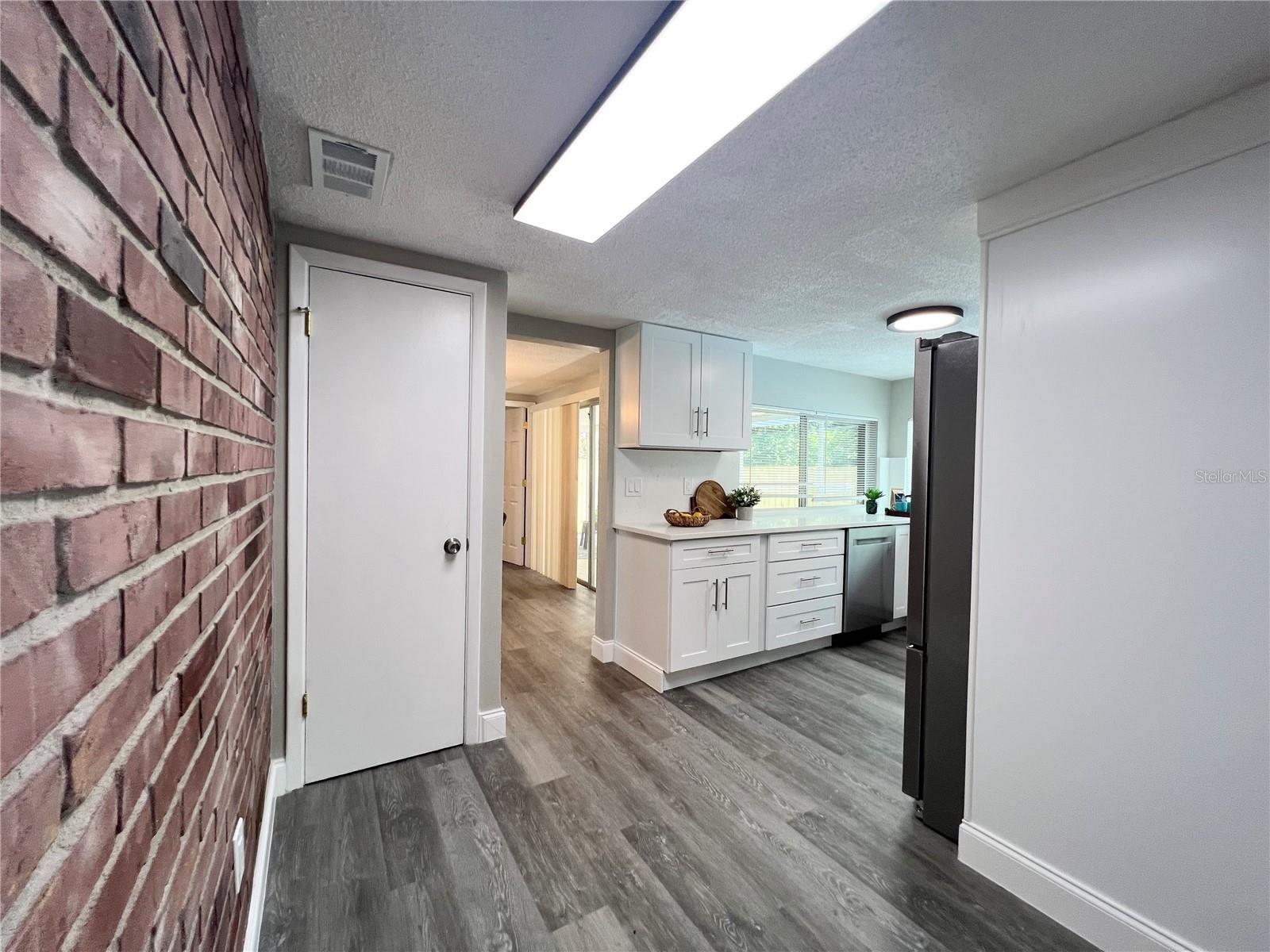 BREAKFAST NOOK AND KITCHEN VIEW FROM FAMILY ROOM