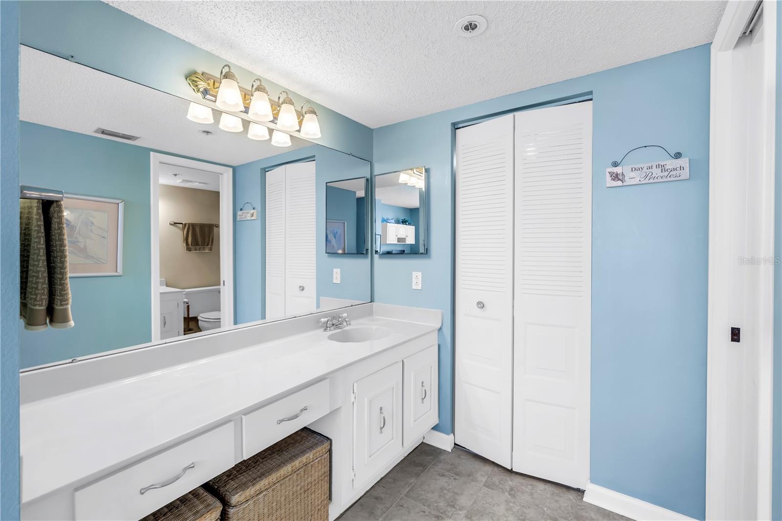 Vanity area outside of guest bath.  Walk-in closet