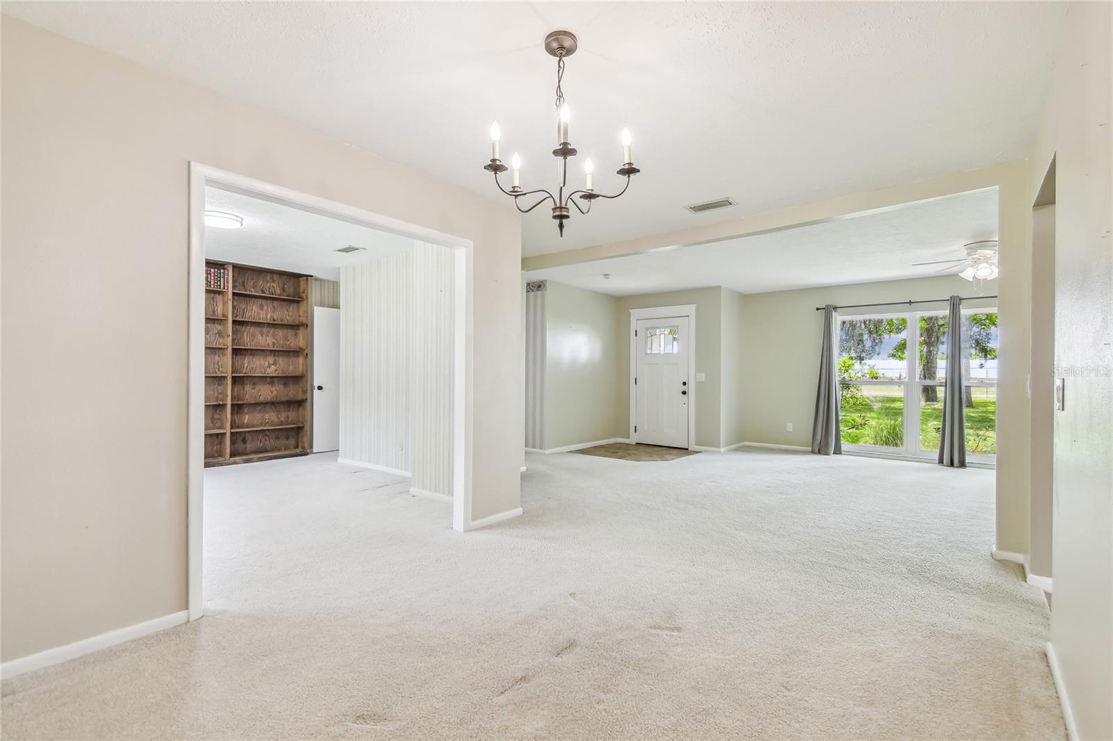 Front door to living room and dining room