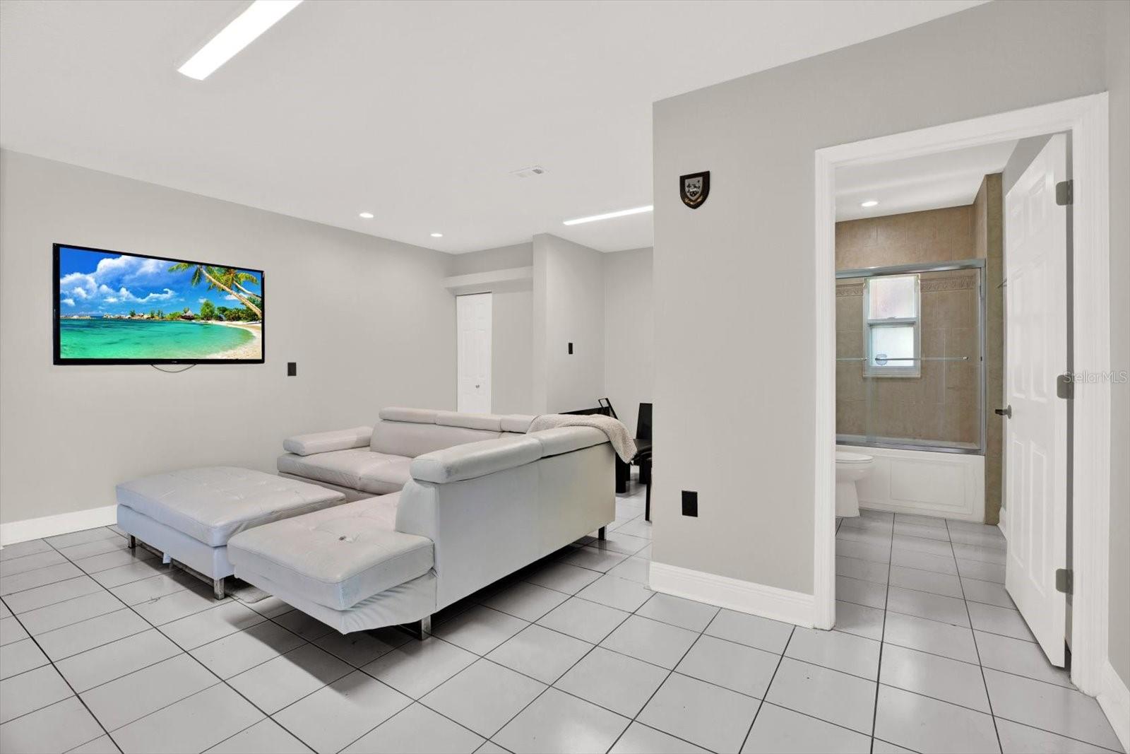 Family room and pool bathroom
