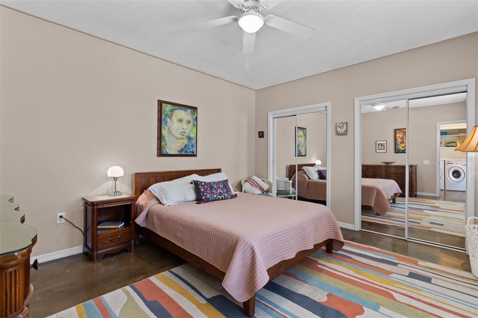 Primary bedroom with ensuite bathroom and large closet