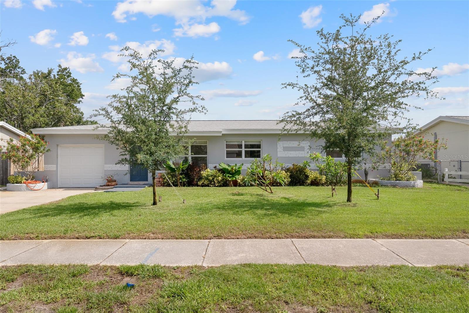 Front of Home - Flanked by 2 Oak Trees