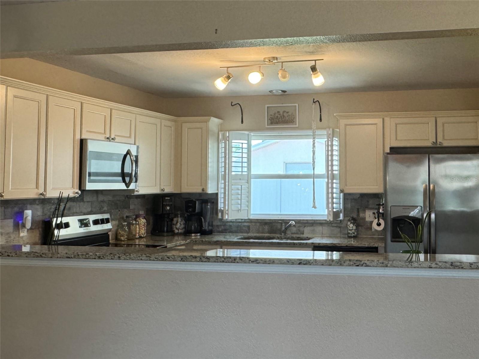 Kitchen opening to living room