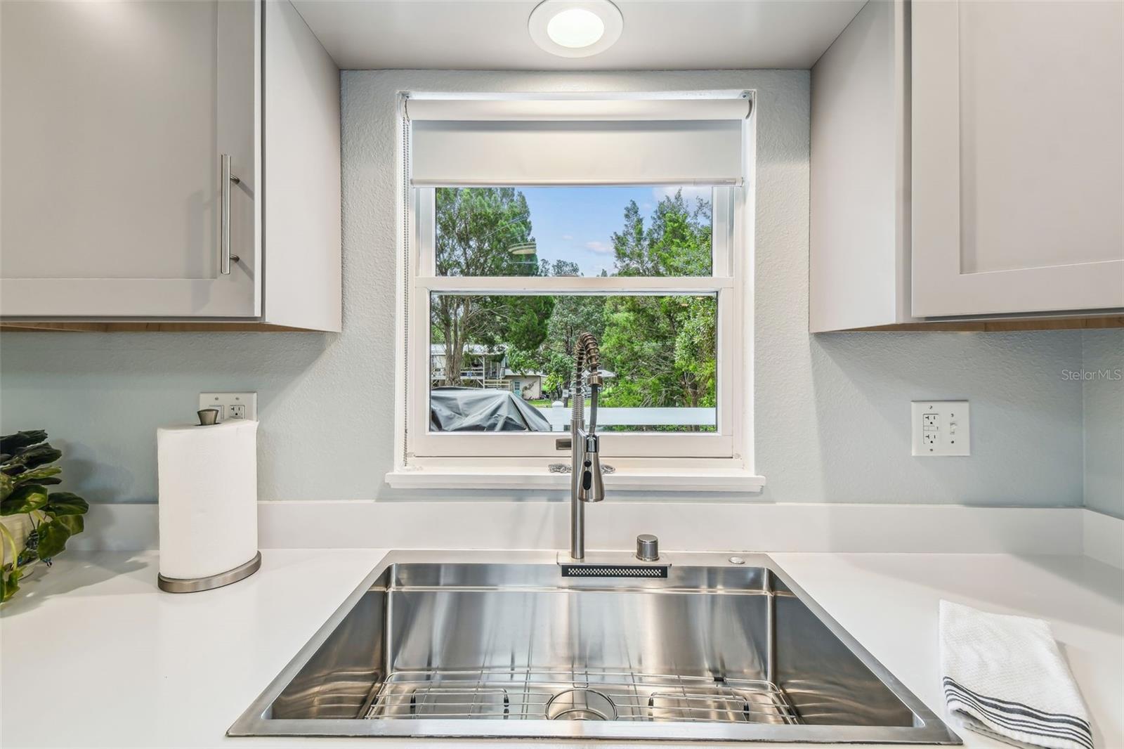 Farmhouse sink overlooking the outdoors