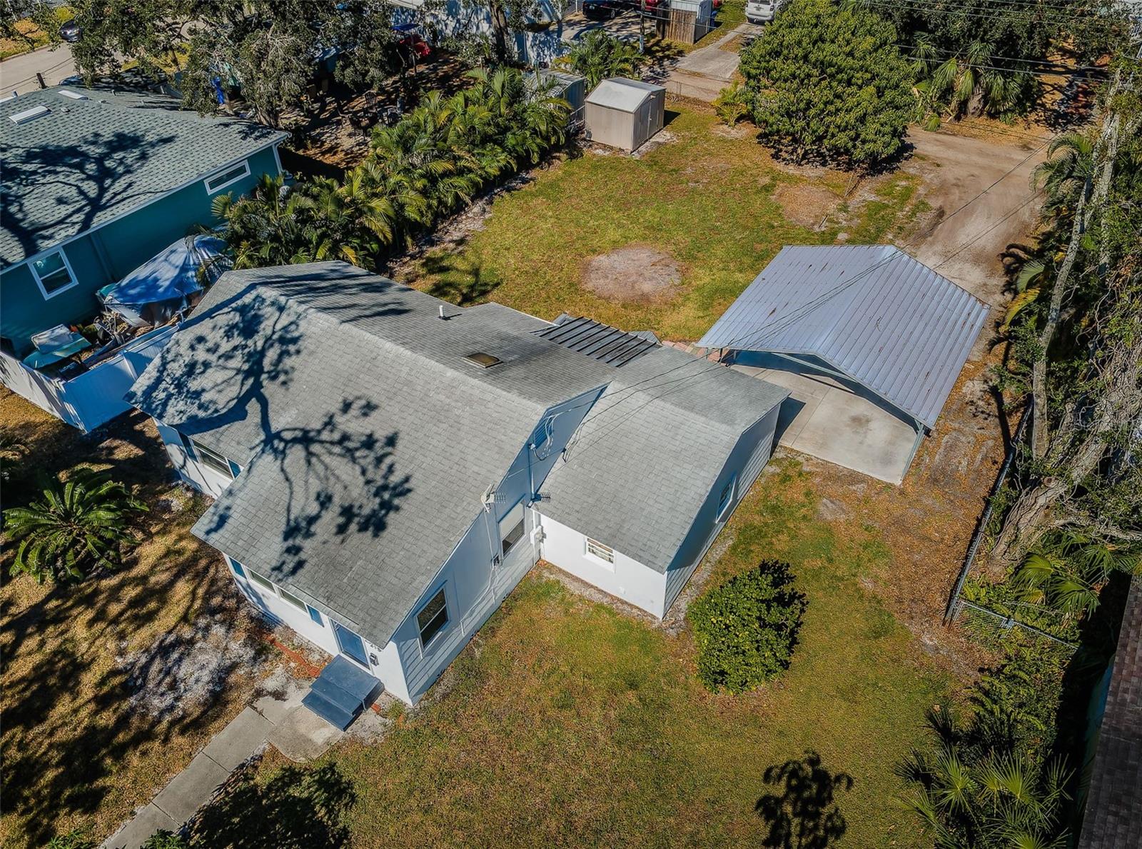 Private access from the rear alley to your sweet oasis.