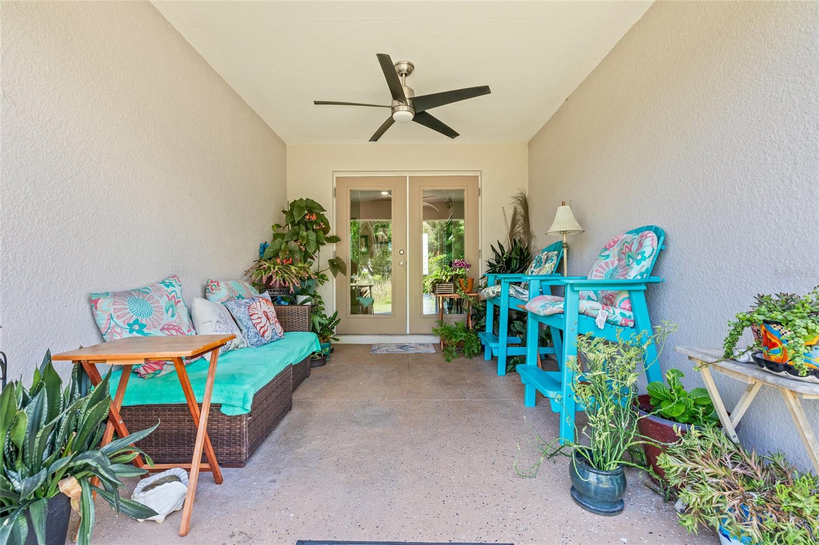 This relaxing patio is the perfect escape. With dual glass doors, a ceiling fan, and space for seating and plants, it’s your personal oasis to unwind or entertain.