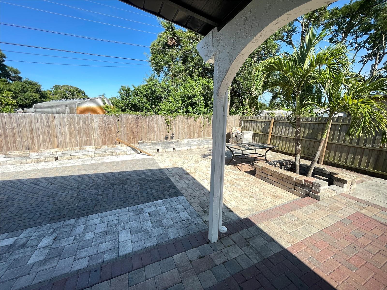 Back Yard  mostly covered with pavers
