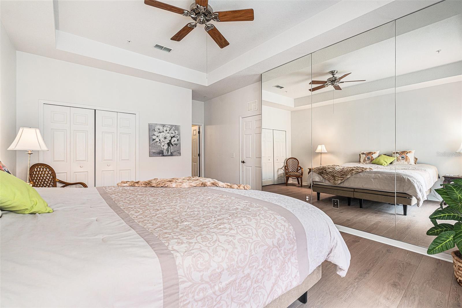 The mirrors on the opposite wall make an already large room seem even larger