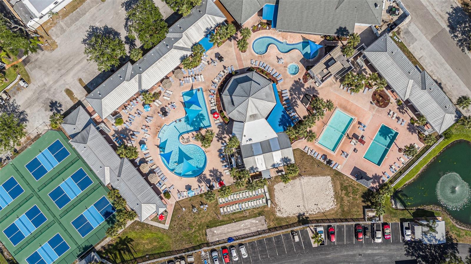 Large swimming pool, Volleyball courts, Pickleball courts, Play houses and more