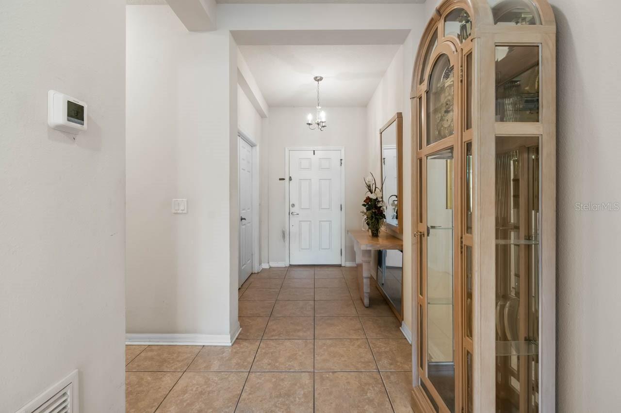 Private hallway to the right leading to 2nd and 3rd bedrooms and full bath