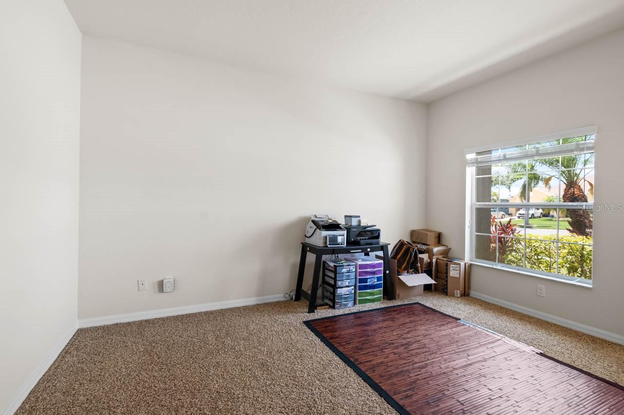 Office/Den with natural light in the front of the home