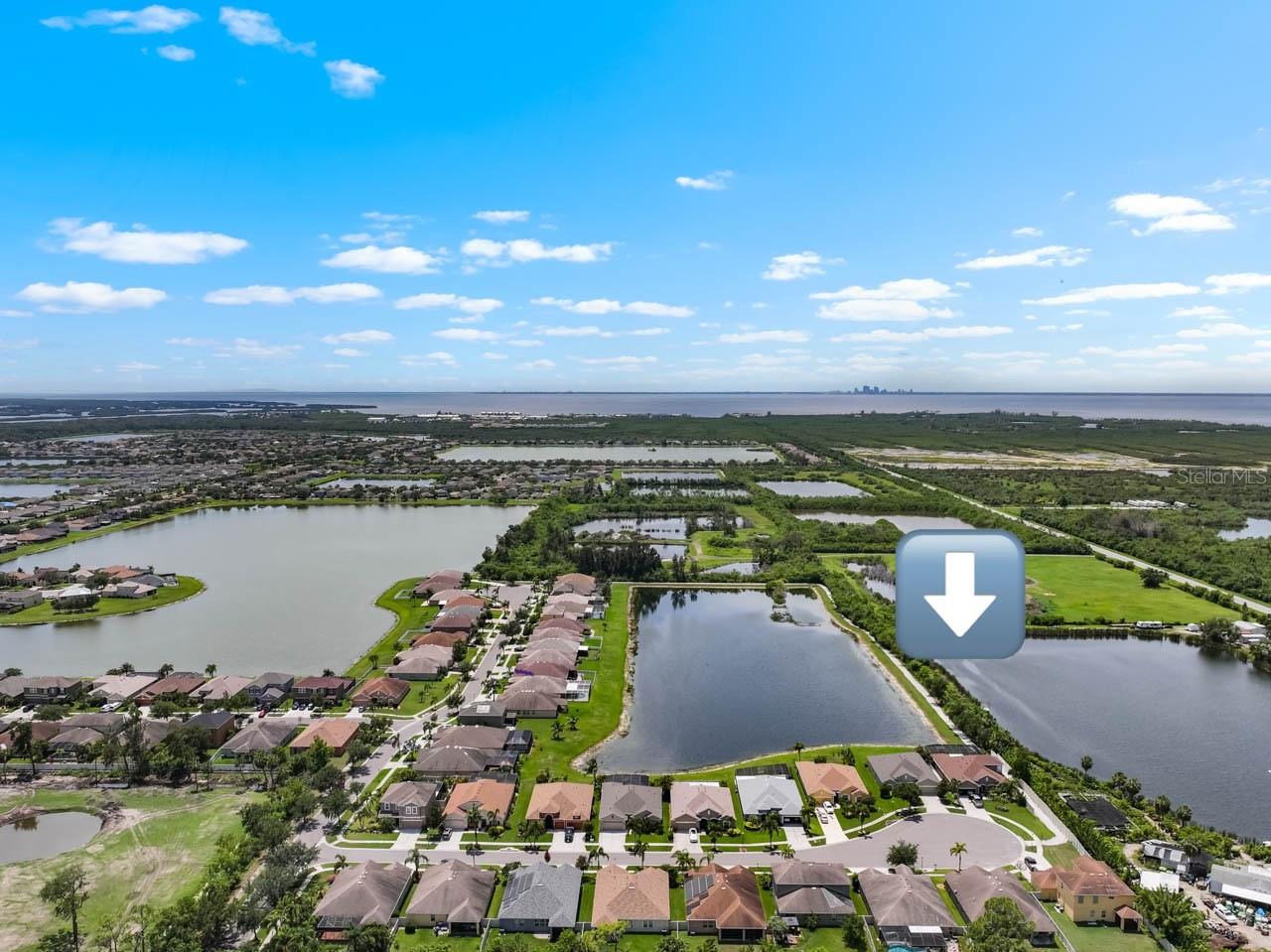 Walking path adjacent to home that leads around the lake