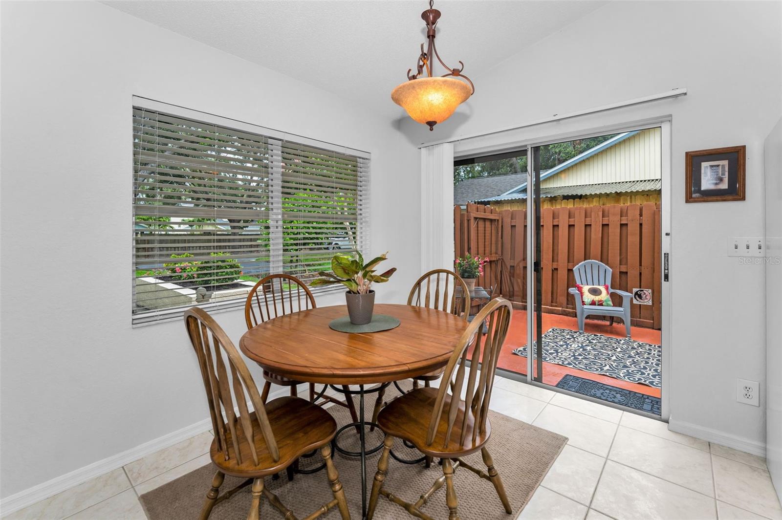 Sliders and windows make the space light and bright.
