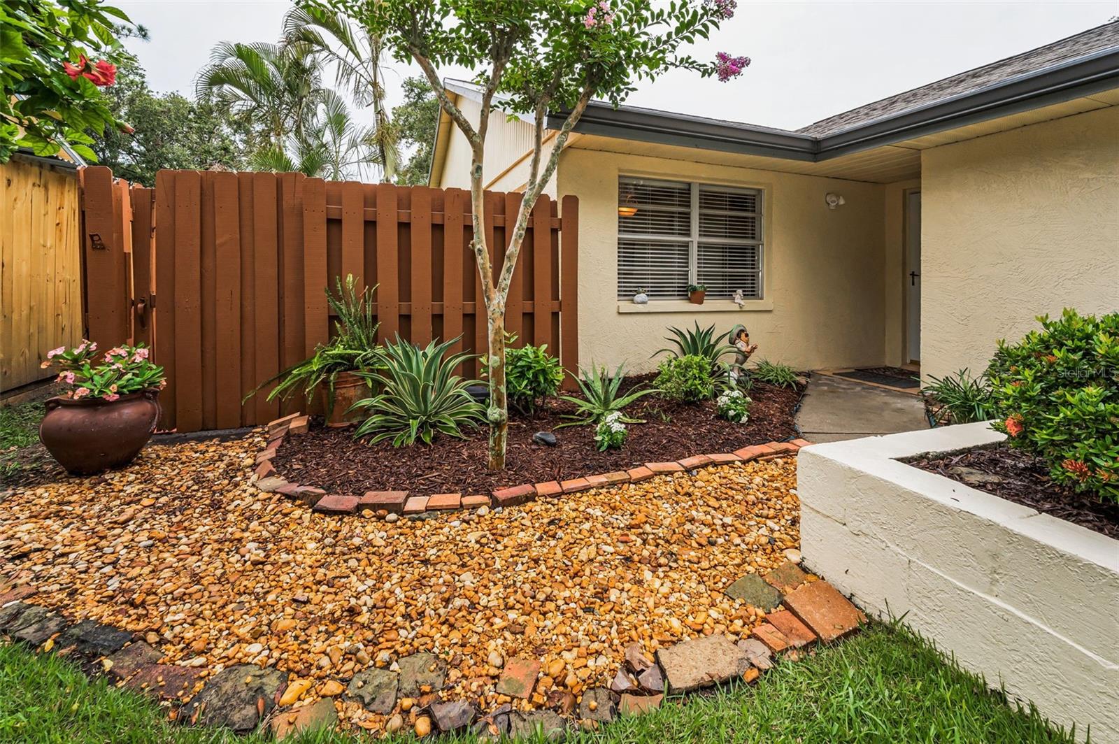 Beautifully landscaped greenspace and private entry