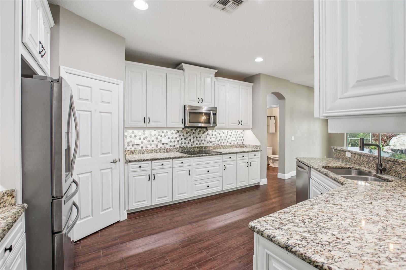 Expansive kitchen with granite counters