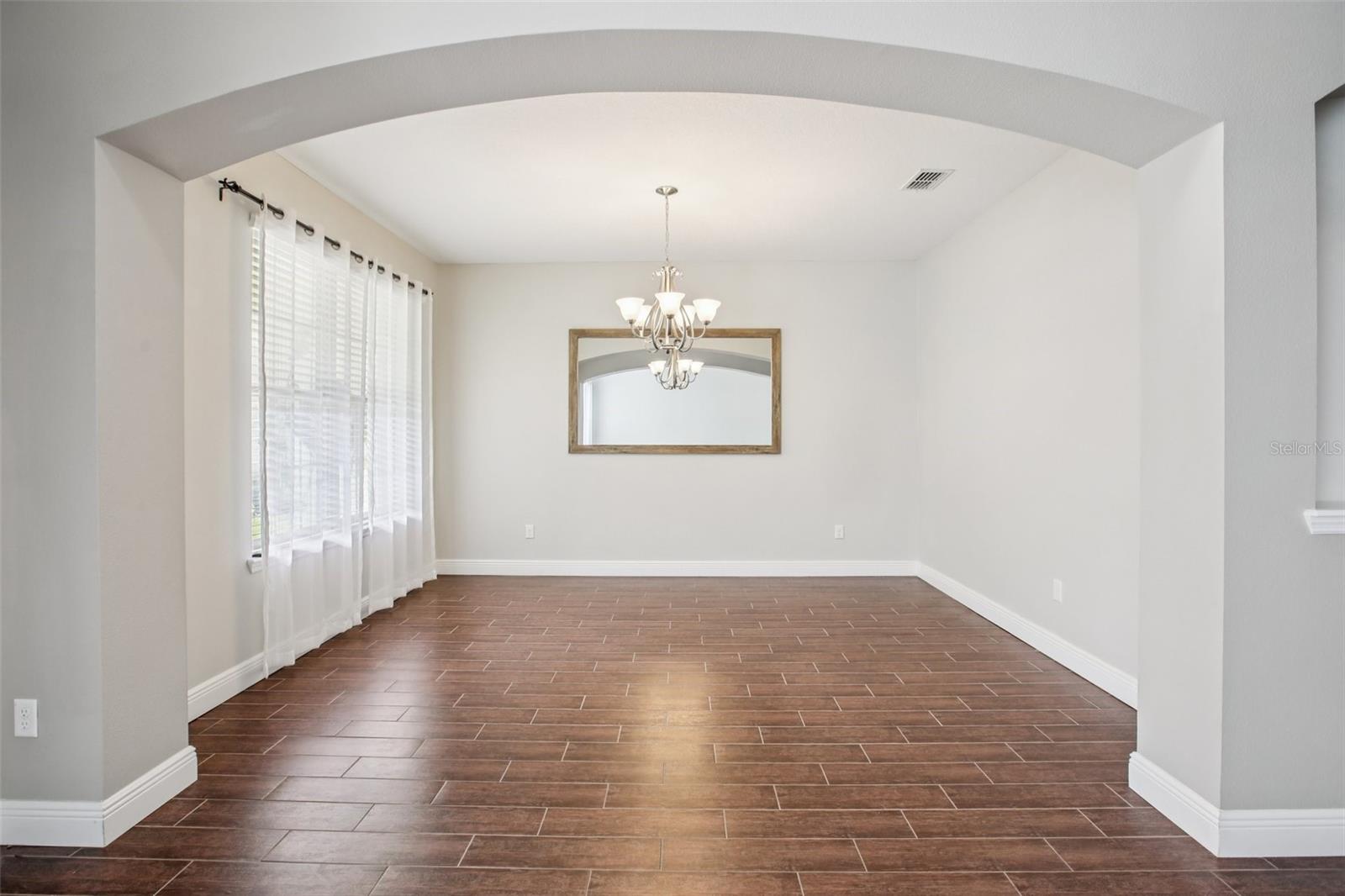 Elegant dining room with archway