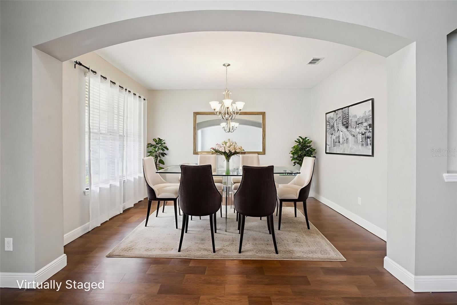 Stylish virtually staged dining space