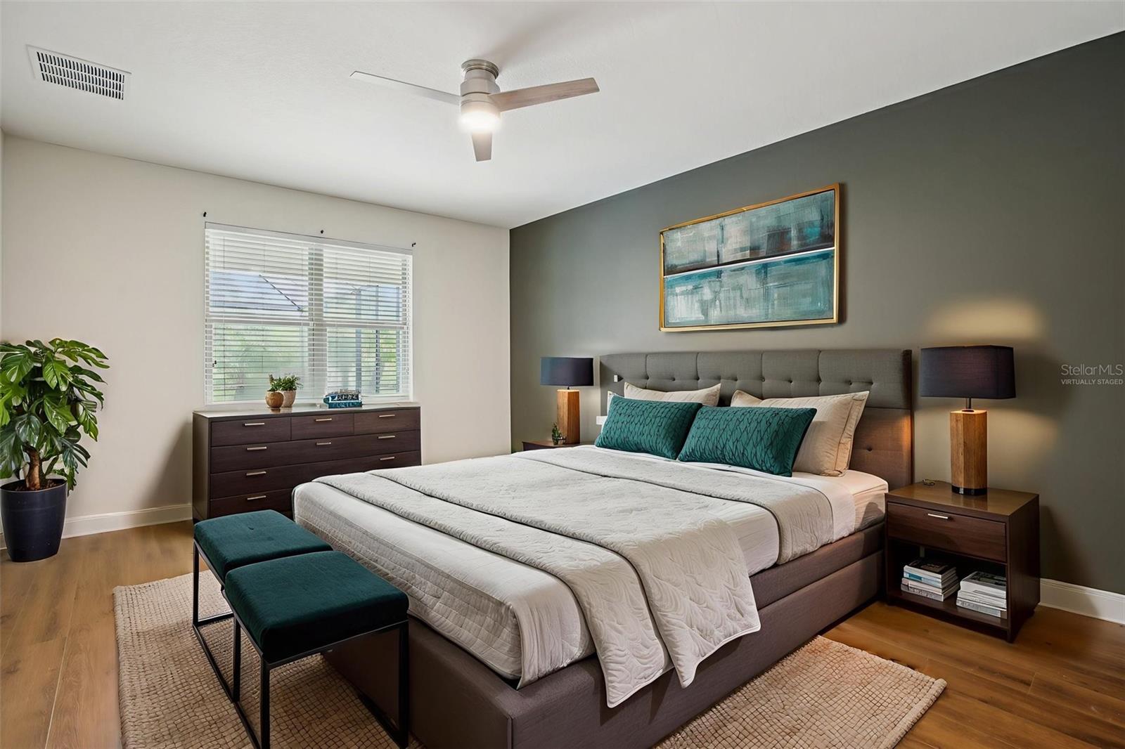 Sleek virtually staged owner’s suite