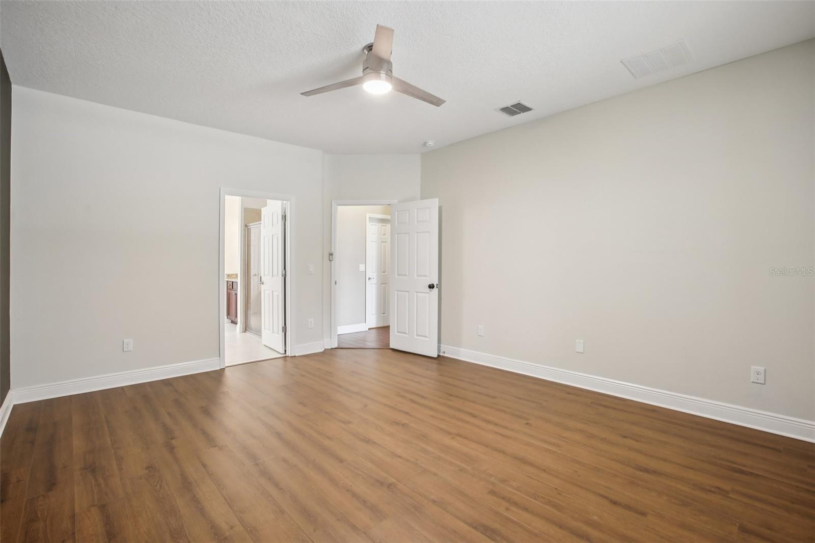Spacious primary bedroom with ensuite