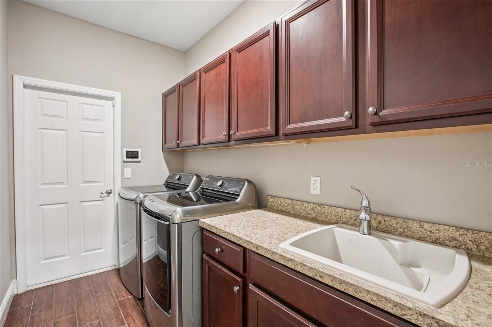 Spacious laundry with sink