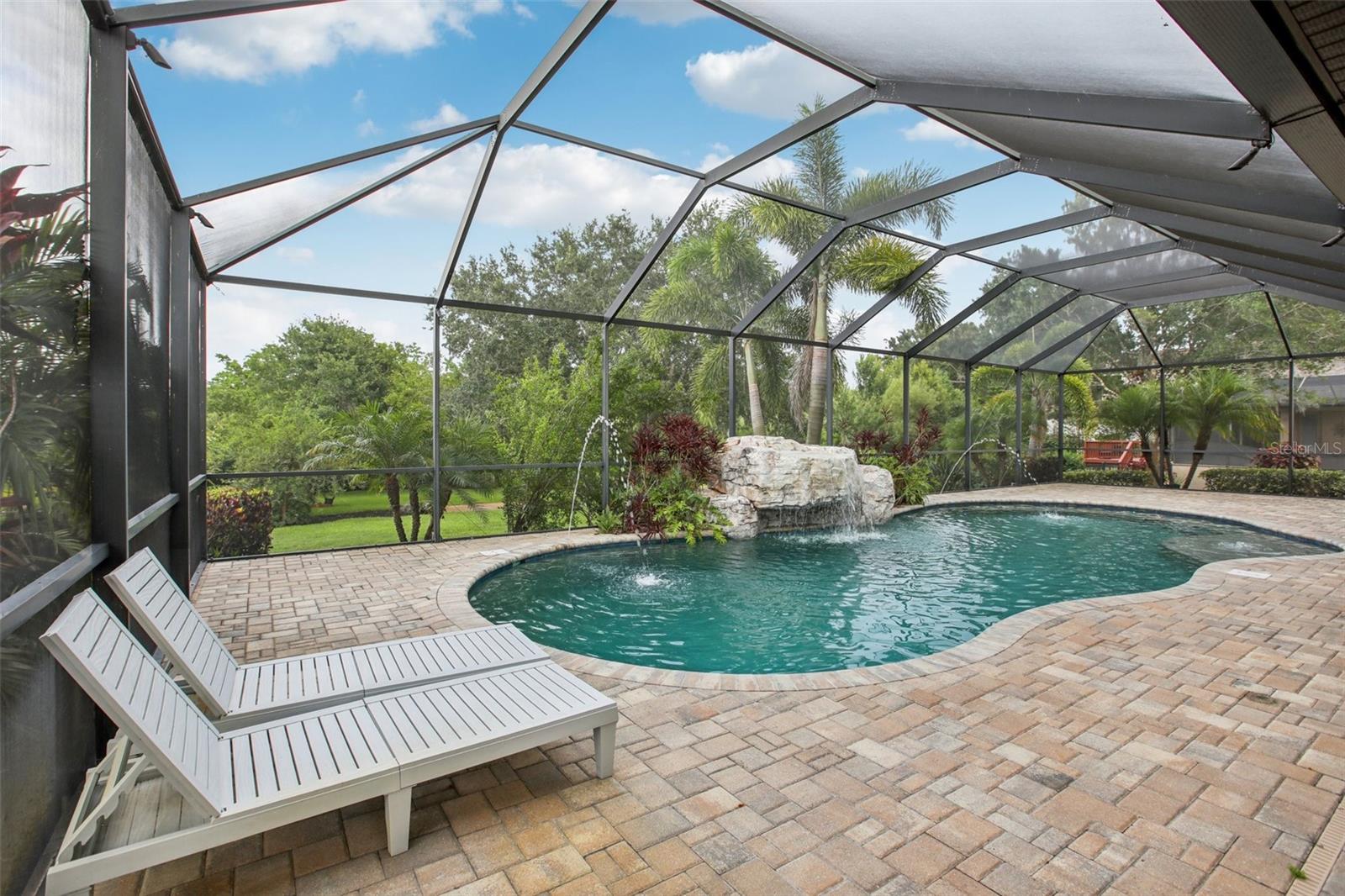 Resort-style lanai and waterfall pool