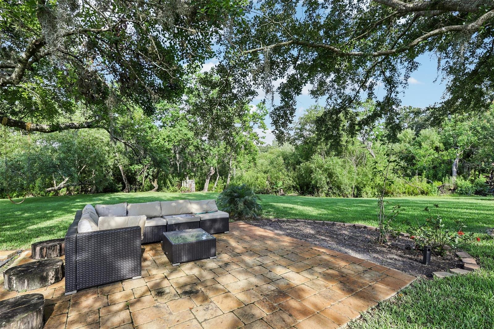 Serene spot facing lush backyard expanse