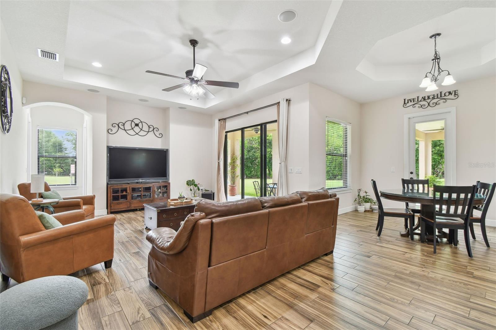 LIVING ROOM WITH TRAY CEILINGS
